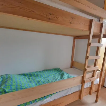 Three-bedroom In Hébergement de vacances *