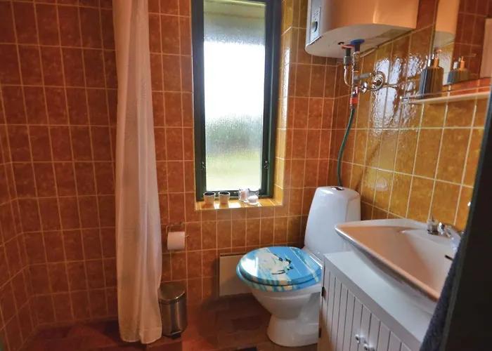 Three-bedroom In Hébergement de vacances *