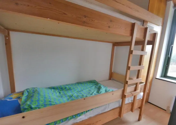 Three-bedroom In Hébergement de vacances *